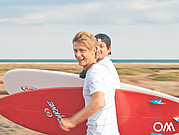 [Translate to Polski:] kontynuuj surfowanie po naszej domowej plaży po lekcji surfowania